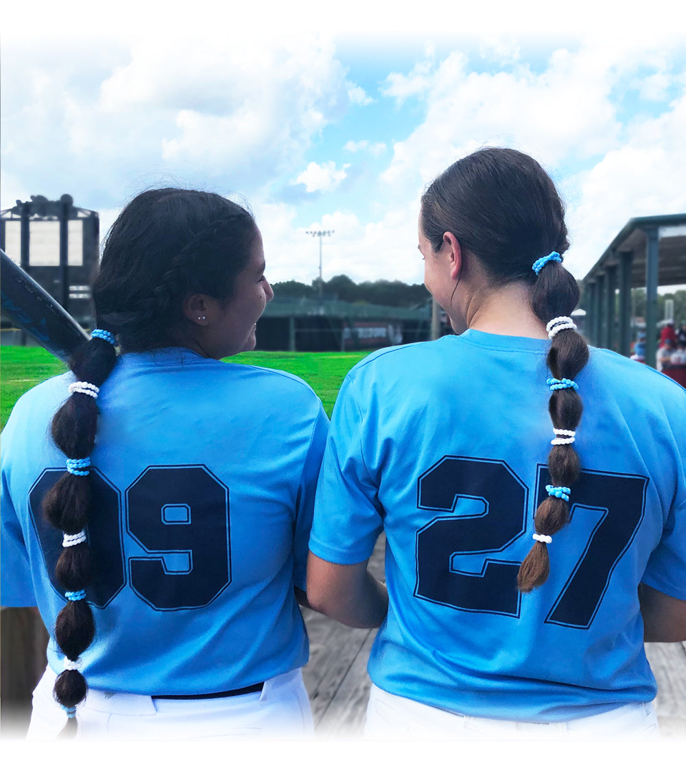 3 Softball Hairstyles That Are Perfect For The Game